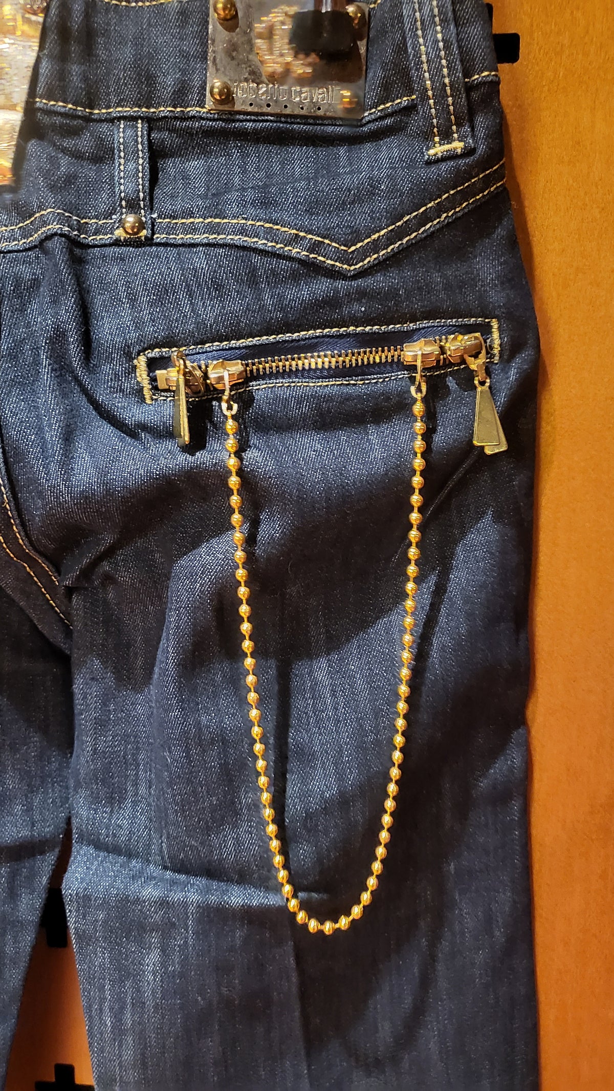 Roberto Cavalli indigo 90s jeans with chain at back pockets